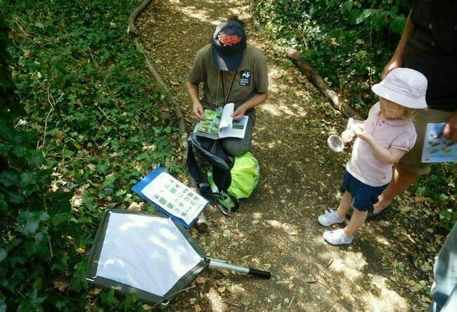 Entomologist and volunteers at the Work on Bugs Day, Gunnersbury Triangle Nature Reserve
