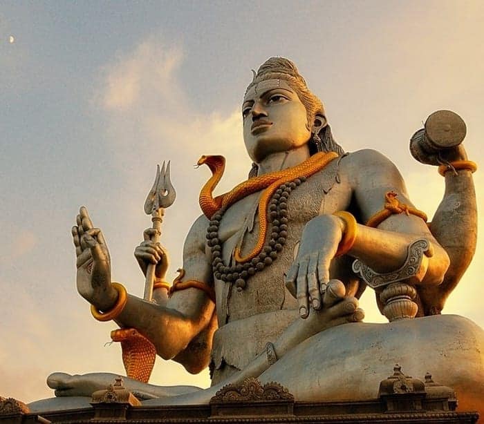 Statue of Shiva with a cobra, snake symbolism in India