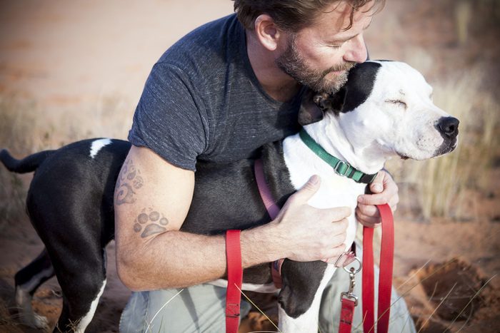 Man with HIs Pit Bull Mix