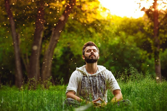 Man Meditating in Nature