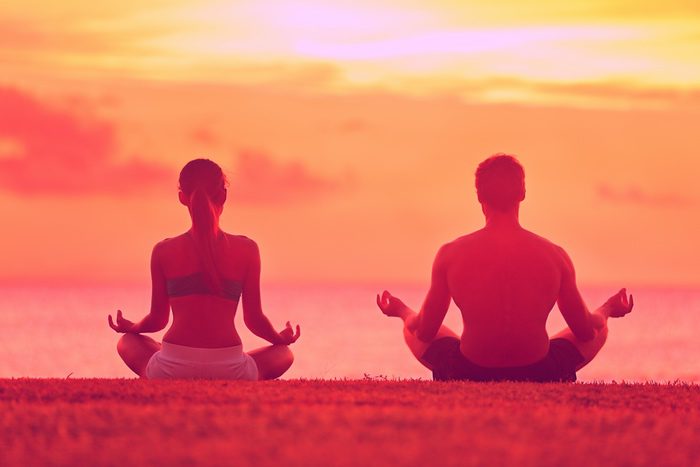 Couple Meditating Red
