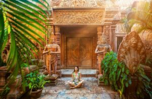 Women Meditating in Greenery