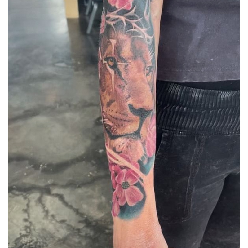 26 Lion Tattoo Meanings + Lioness & Lion Cub Tattoos UniGuide