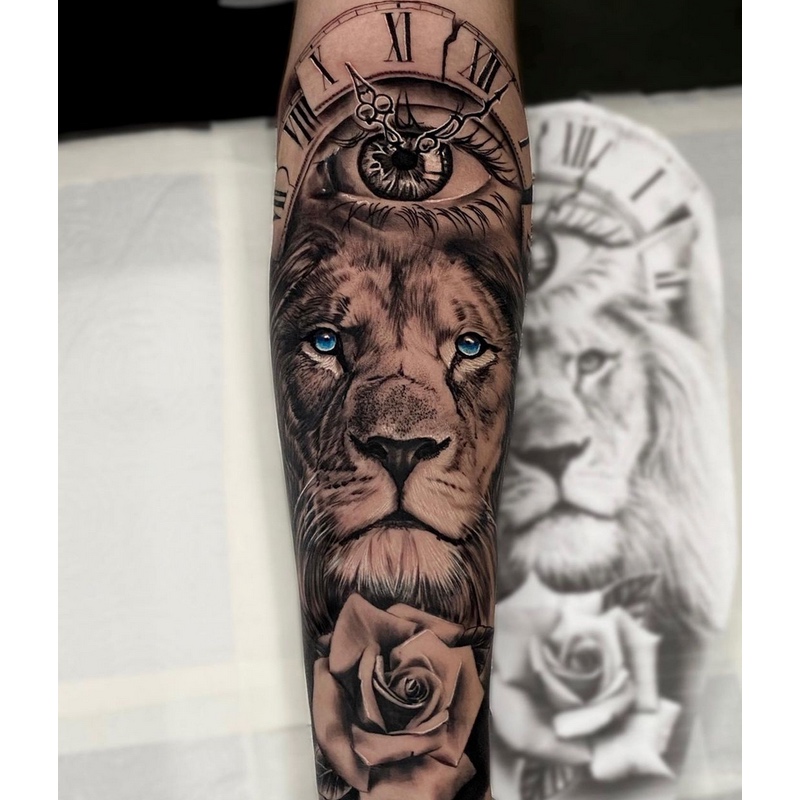 Bold Blue Eyes Lion Tattoo from Tattooinkmaster | Tattoo Ink Master-cheohanoi.vn