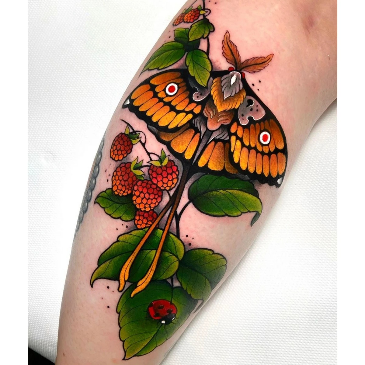 Orange and Red Moth Tattoo