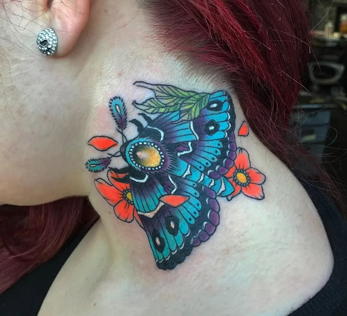 Moth Tattoo on Neck