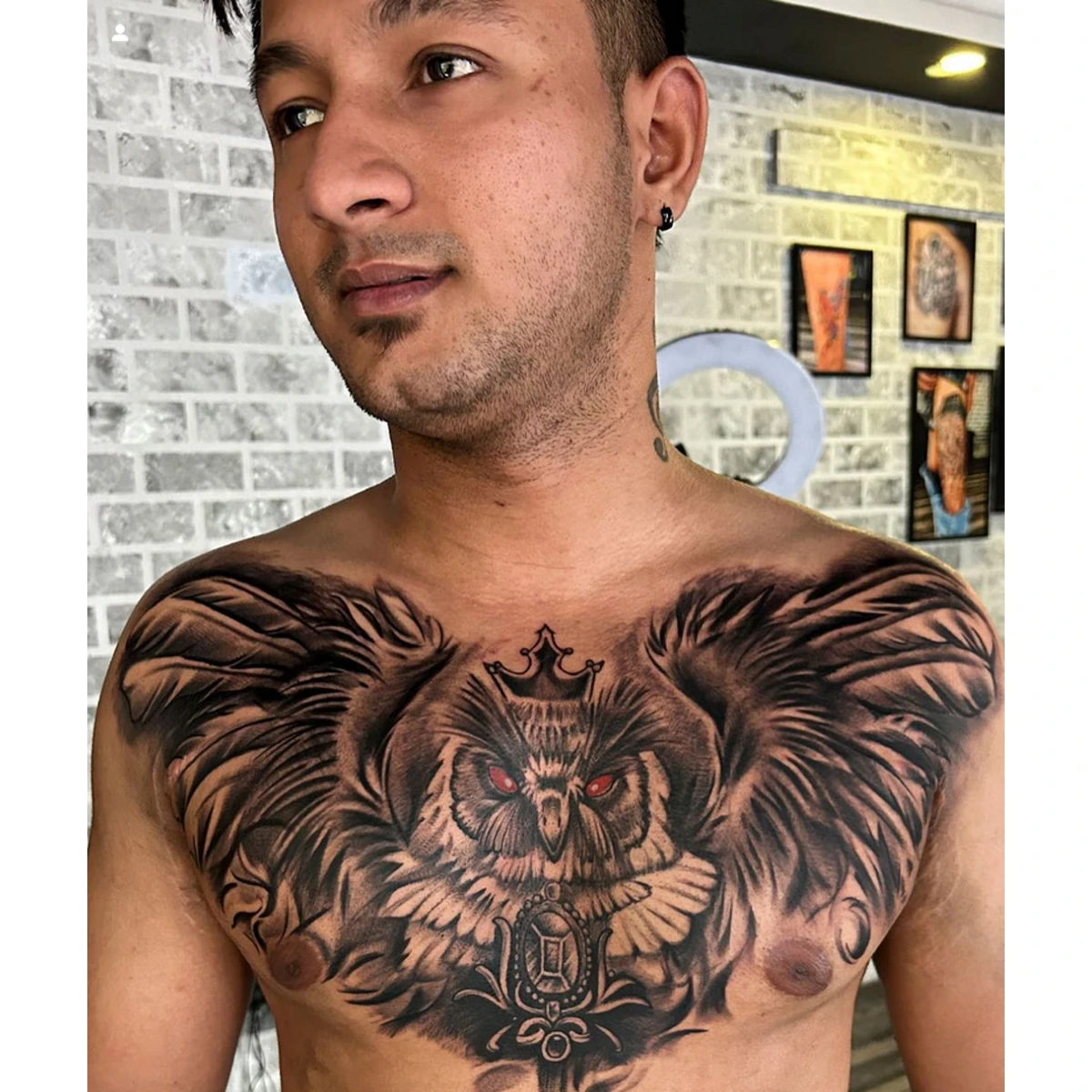 Owl Tattoo on Man's Chest