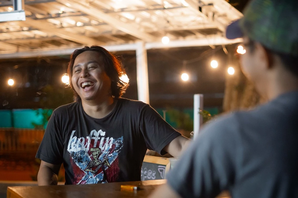 Guy Laughing with Friend